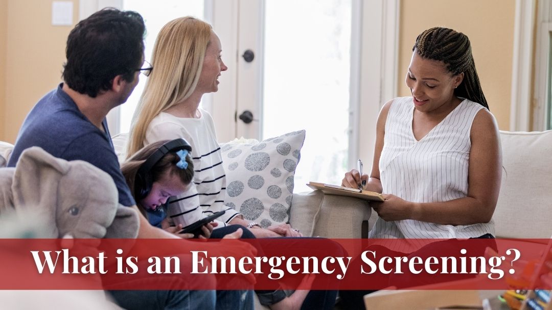 Parents and child talking to an emergency screener.